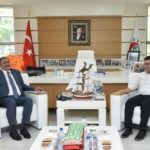 Eski Bakan Eroğlundan Başkan Tütüncüye ziyaret