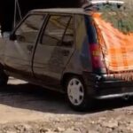 Ceza verdiği otomobilini iki katlı evinin duvarına astı