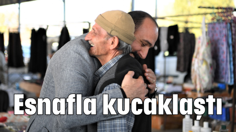 Esnafla kucaklaştı