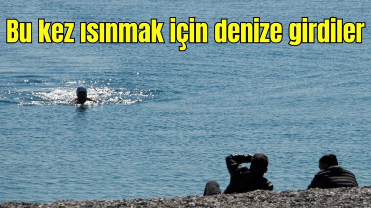 Bu kez ısınmak için denize girdiler