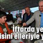 İftarda yemek servisini elleriyle yaptı