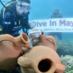 Su altına dalıp, taşa yazdıkları Hıdırellez dileklerini yapay amforalara bıraktılar