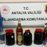 Evinde sahte içkiyle yakalandı