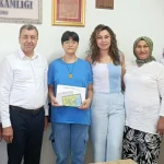 Kumluca'da YKS'de ilk bine giren üç öğrenciye ödül