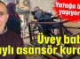 Üvey baba raylı asansör kurdu
