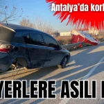 Antalya'da korkutan kaza! Bariyerlere asılı kaldı