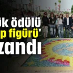 Büyük ödülü 'Akrep figürü' kazandı